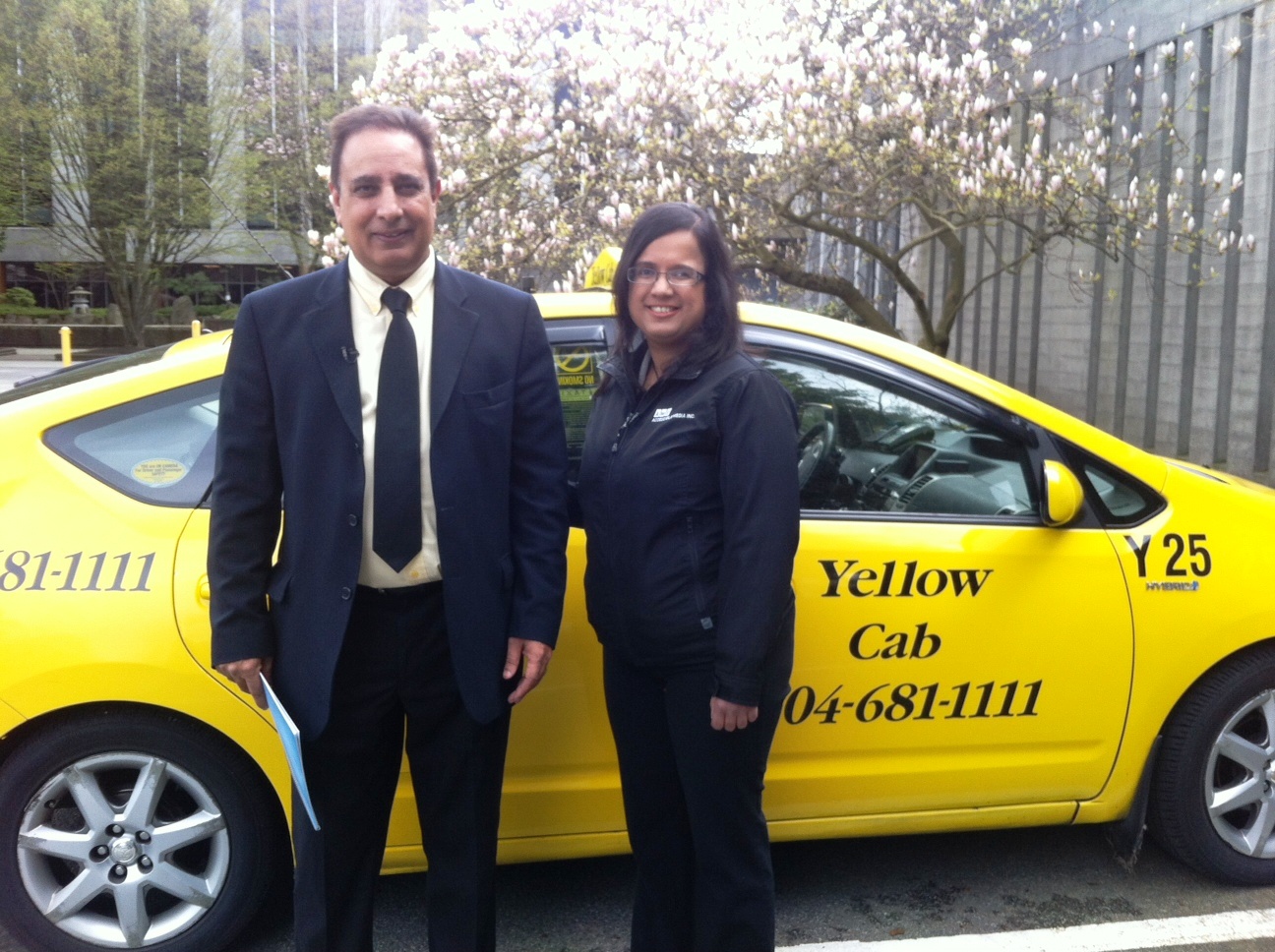 Kristy with a driver from Yellow Cab