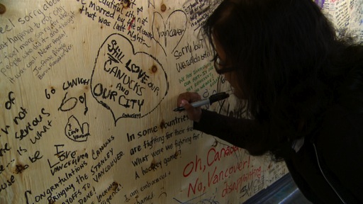 Kristy signing Wall of Hope